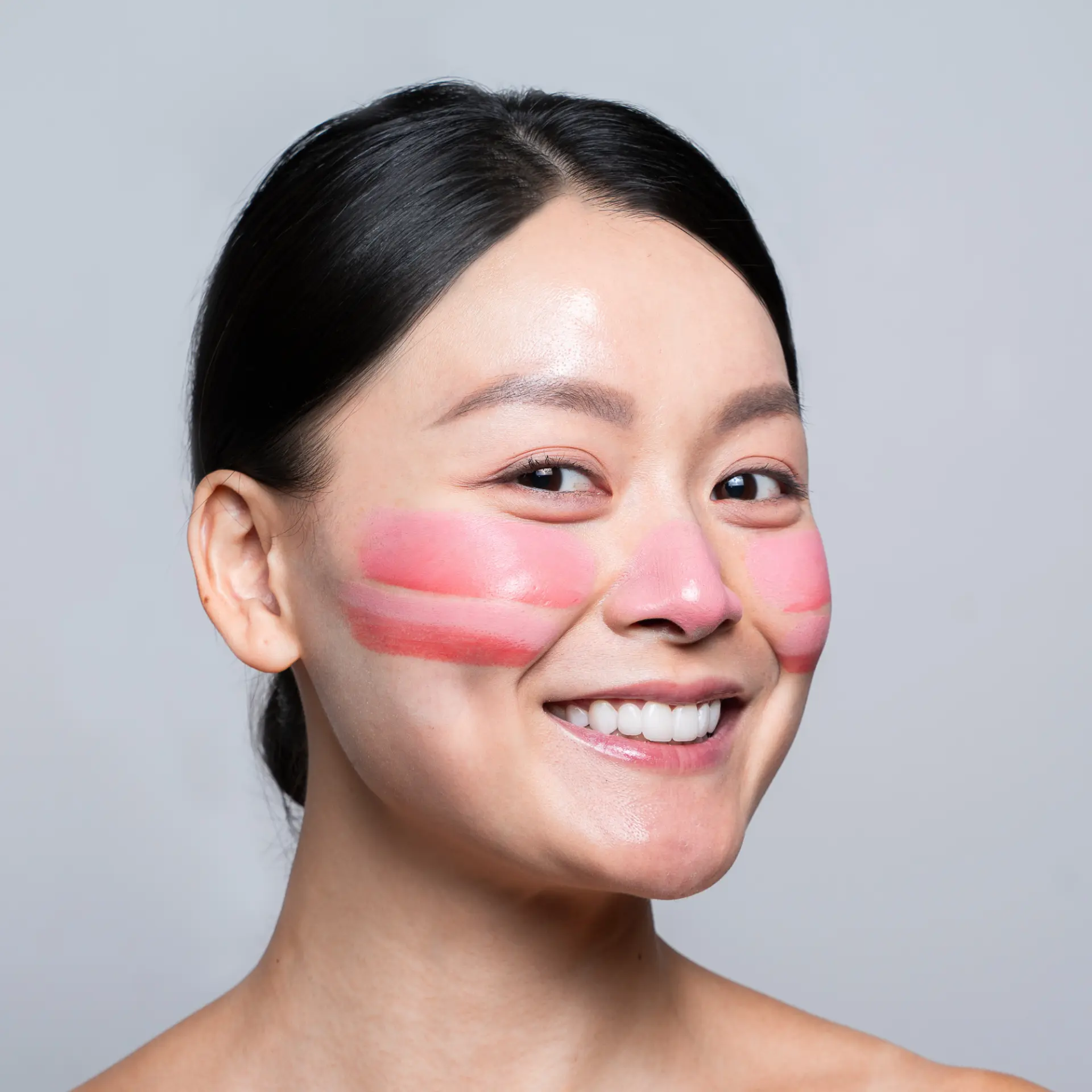 Fresh zinc stripes reapplied across cheeks and nose